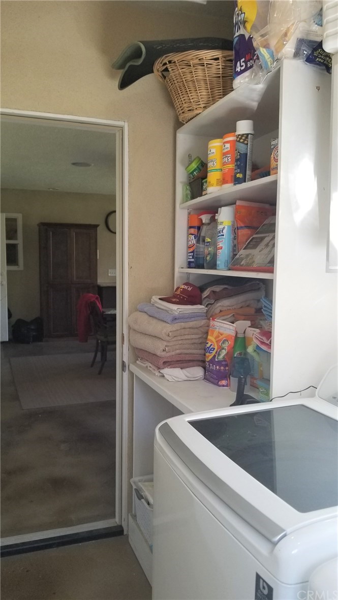 4731 Whipple Road Riverside, CA 92506 - Photo 53 of 66 LAUNDRY ROOM - FLOOR STORAGE CABINET.