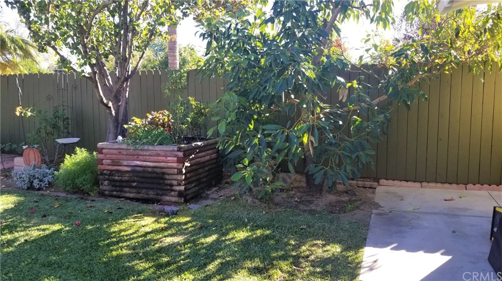 4731 Whipple Road Riverside, CA 92506 - Photo 57 of 66 Herb Garden. REDWOOD LOG Raised Planter Bed (Good for growing Swiss Chard, Jalapenos, Chives). AVOCADO TREE.
