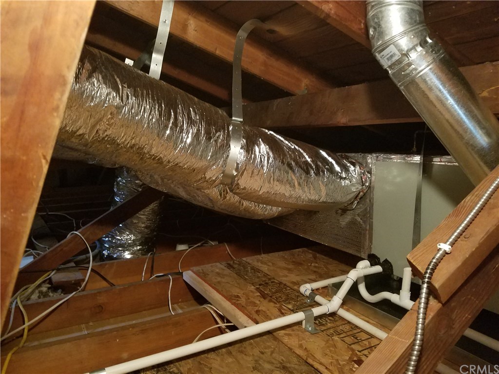 4731 Whipple Road Riverside, CA 92506 - Photo 66 of 66 ATTIC - Newer Trane Furnace & Ducting. NOTE: This photo was taken before New, R-30, Blown-in Insulation was applied. This is an ugly Photo, but it says a lot as to how this Home has been cherished over the last 16 Years!