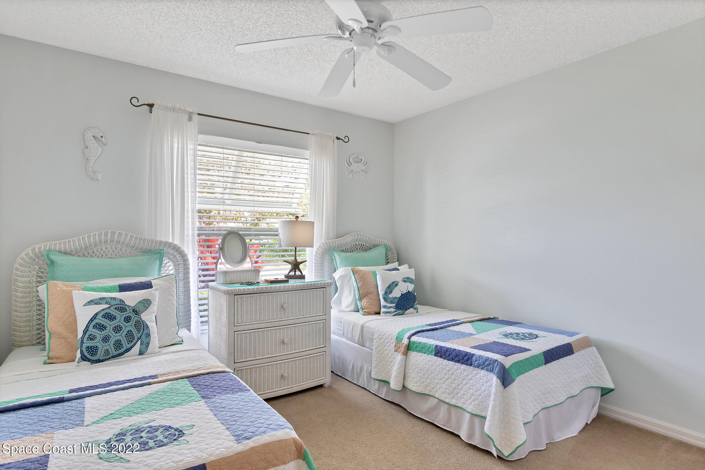 382 Benchor Street Sebastian, FL 32958 - Photo 15 of 34 a room with a bed and a window