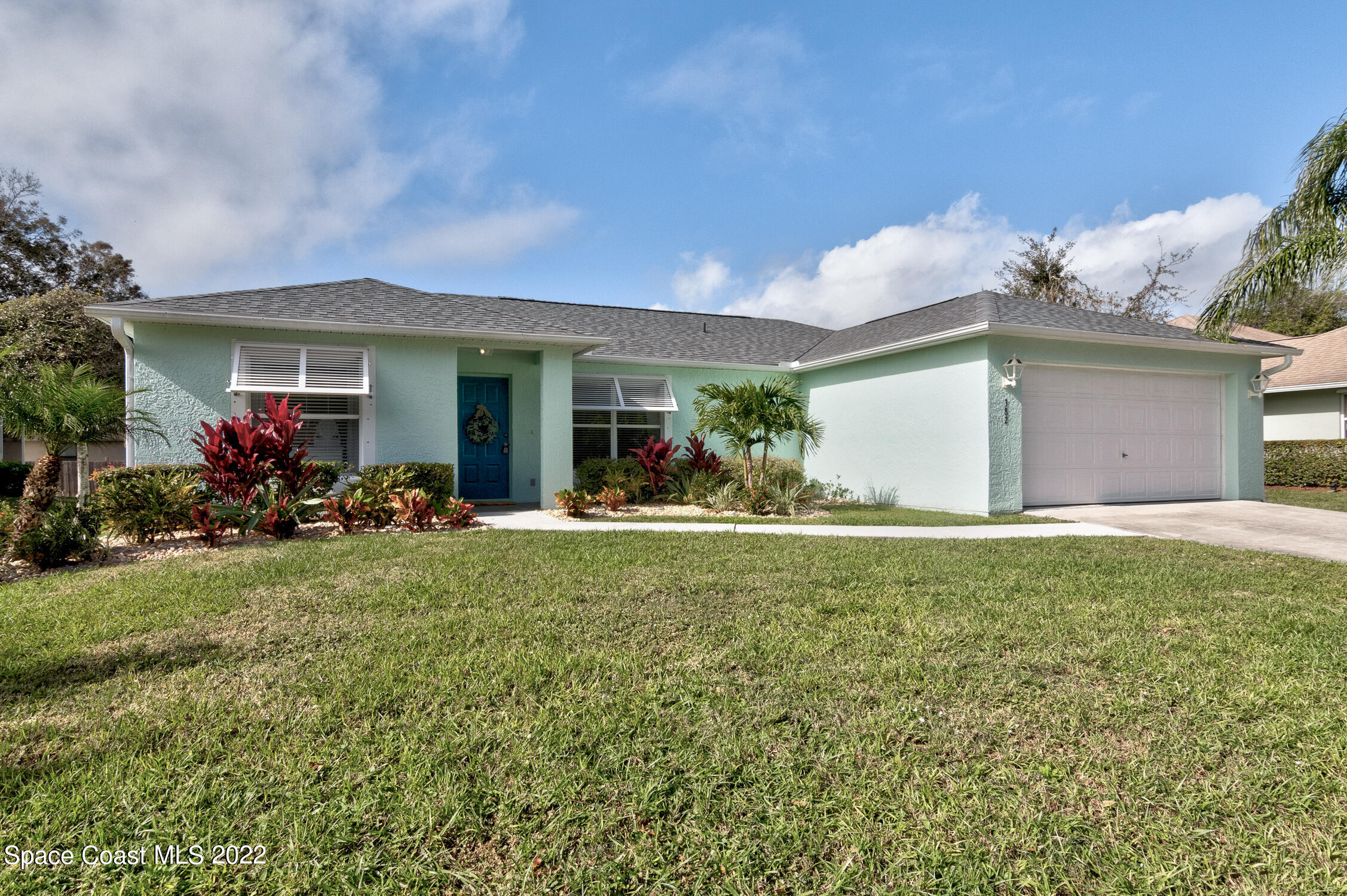 382 Benchor Street Sebastian, FL 32958 - Photo 2 of 34 a view of a house with backyard porch and sitting area