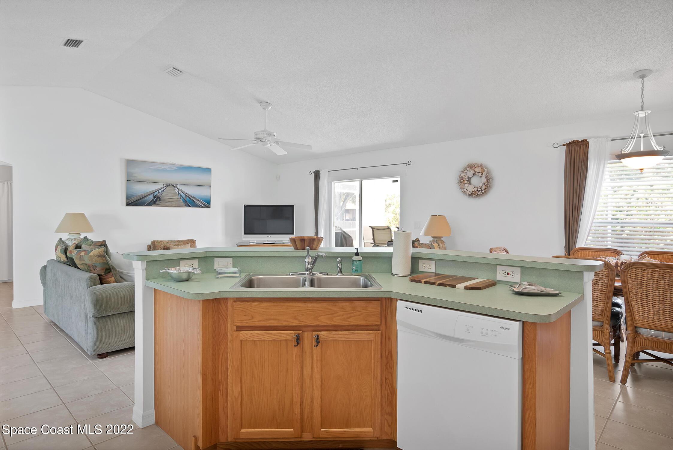 382 Benchor Street Sebastian, FL 32958 - Photo 23 of 34 a bathroom with a granite countertop sink and a mirror