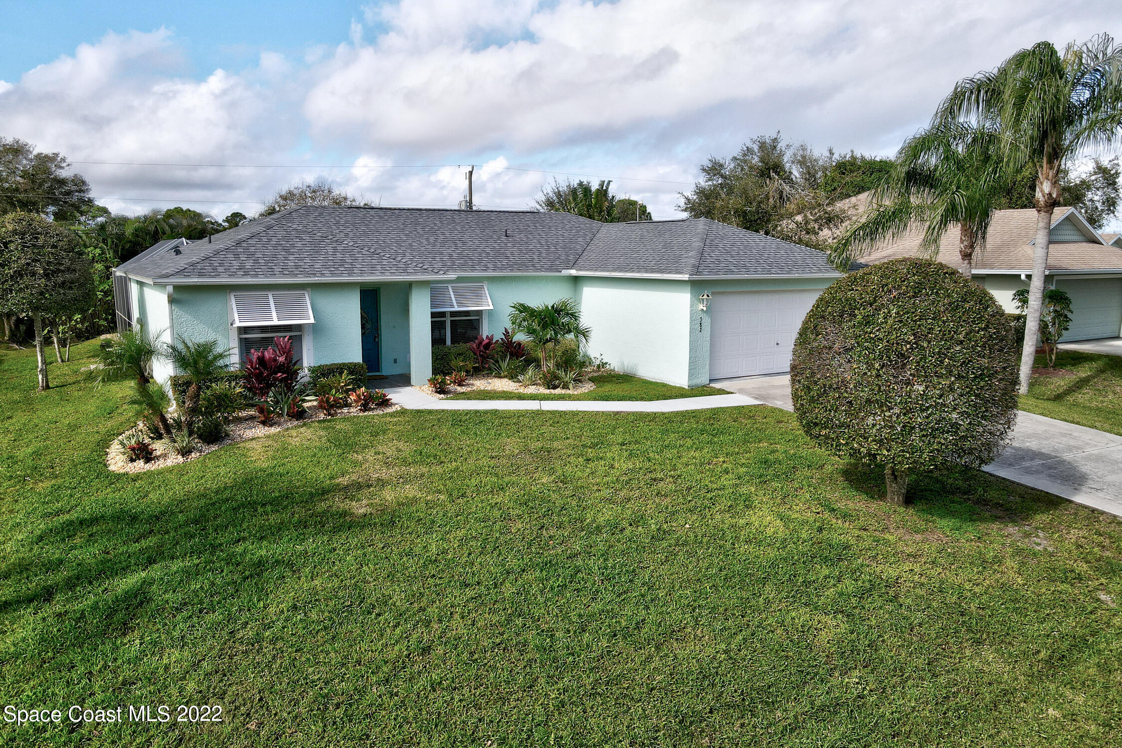 382 Benchor Street Sebastian, FL 32958 - Photo 28 of 34 a view of a house with backyard and sitting area