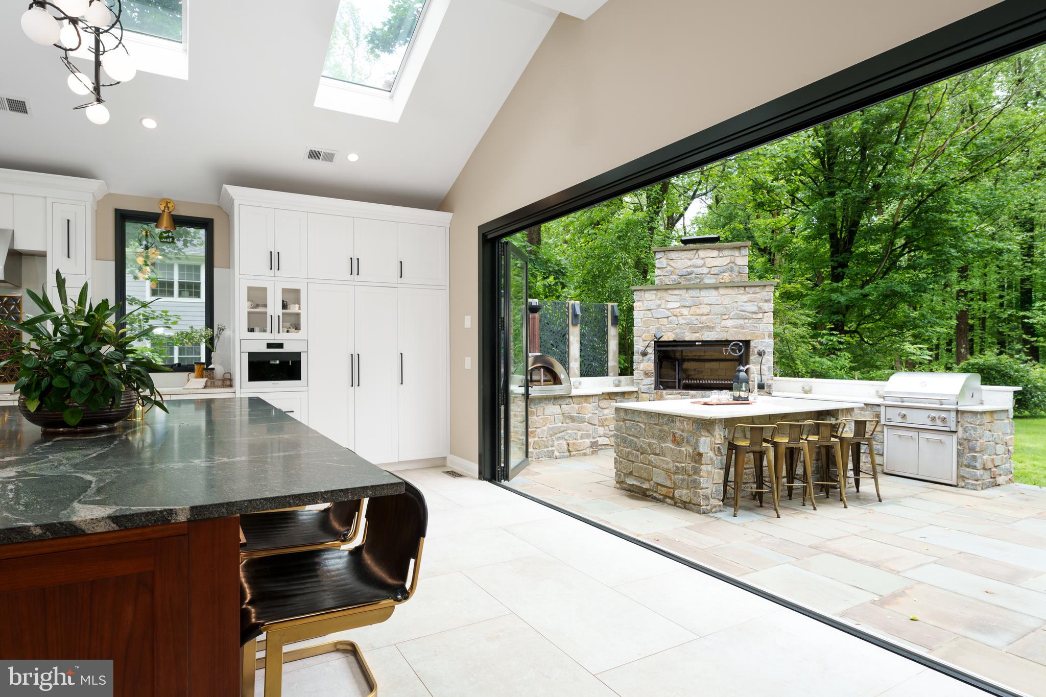 374 Cherry Hill Road Princeton, NJ 08540 - Photo 12 of 42 a kitchen with a table chairs and microwave