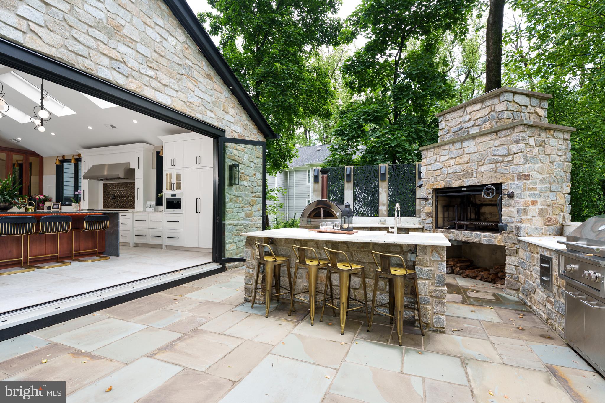 374 Cherry Hill Road Princeton, NJ 08540 - Photo 13 of 42 a table and chairs in a patio