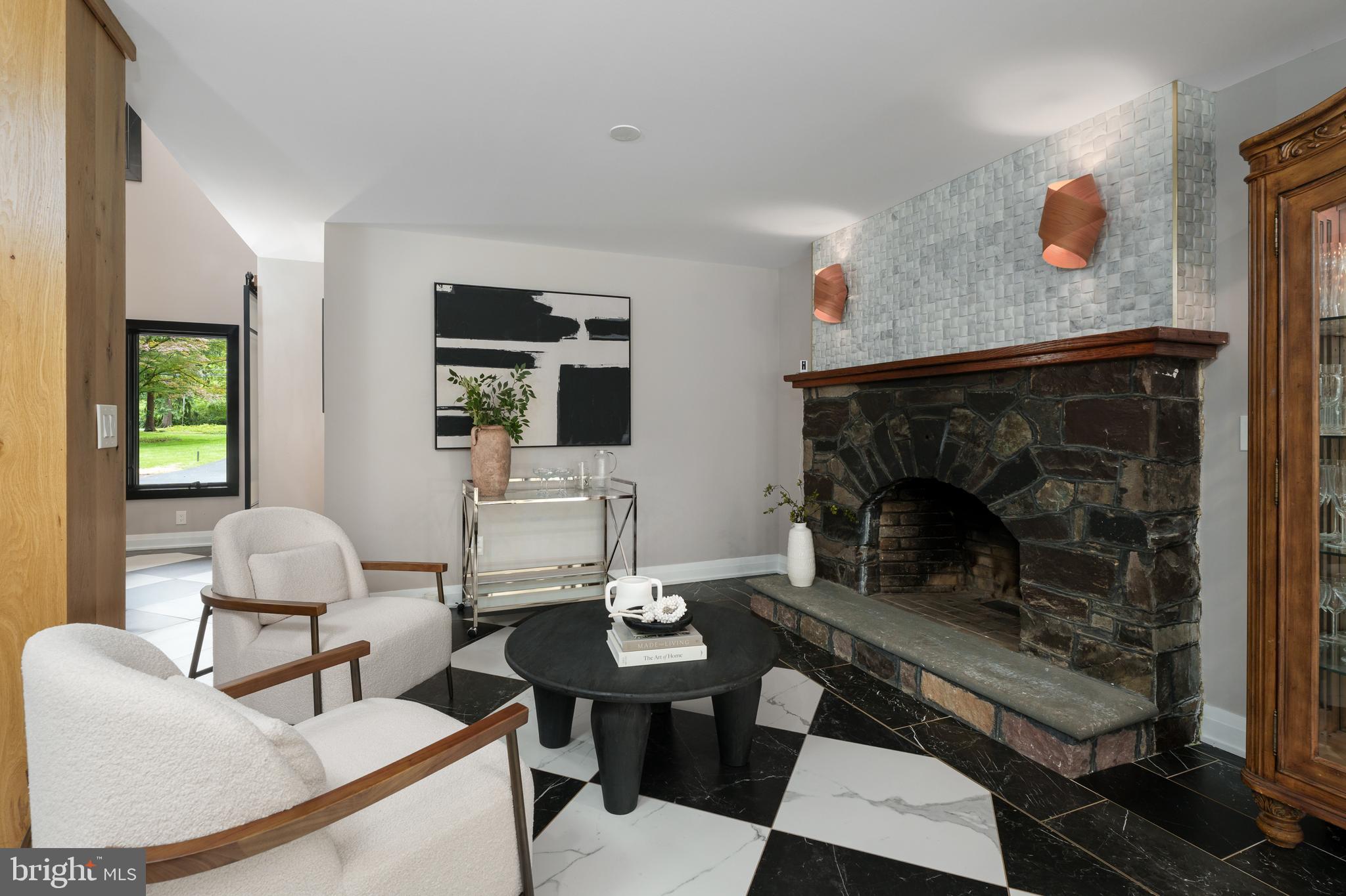 374 Cherry Hill Road Princeton, NJ 08540 - Photo 15 of 42 a living room with furniture and a fireplace