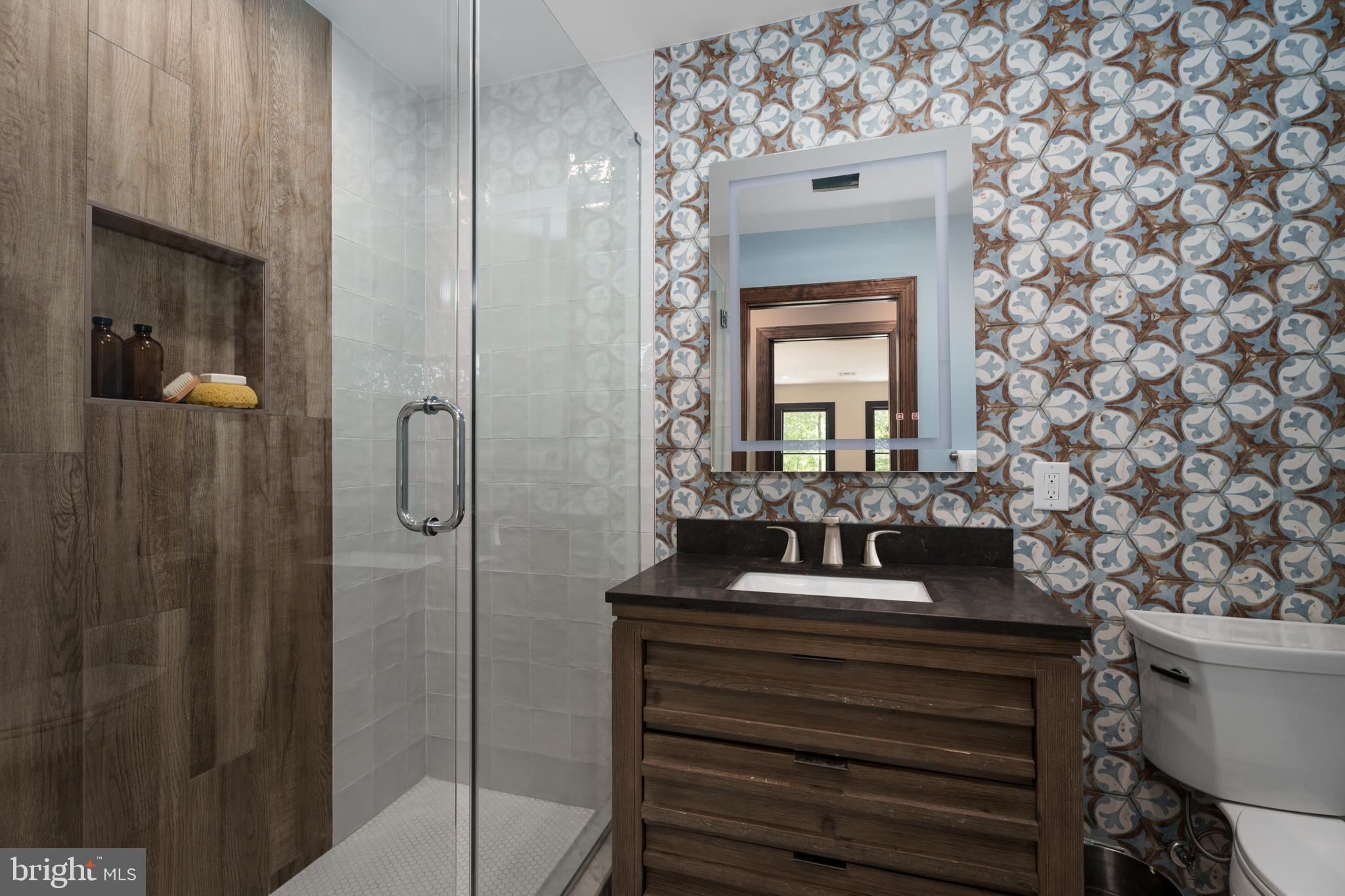 374 Cherry Hill Road Princeton, NJ 08540 - Photo 25 of 42 a bathroom with a sink and a mirror