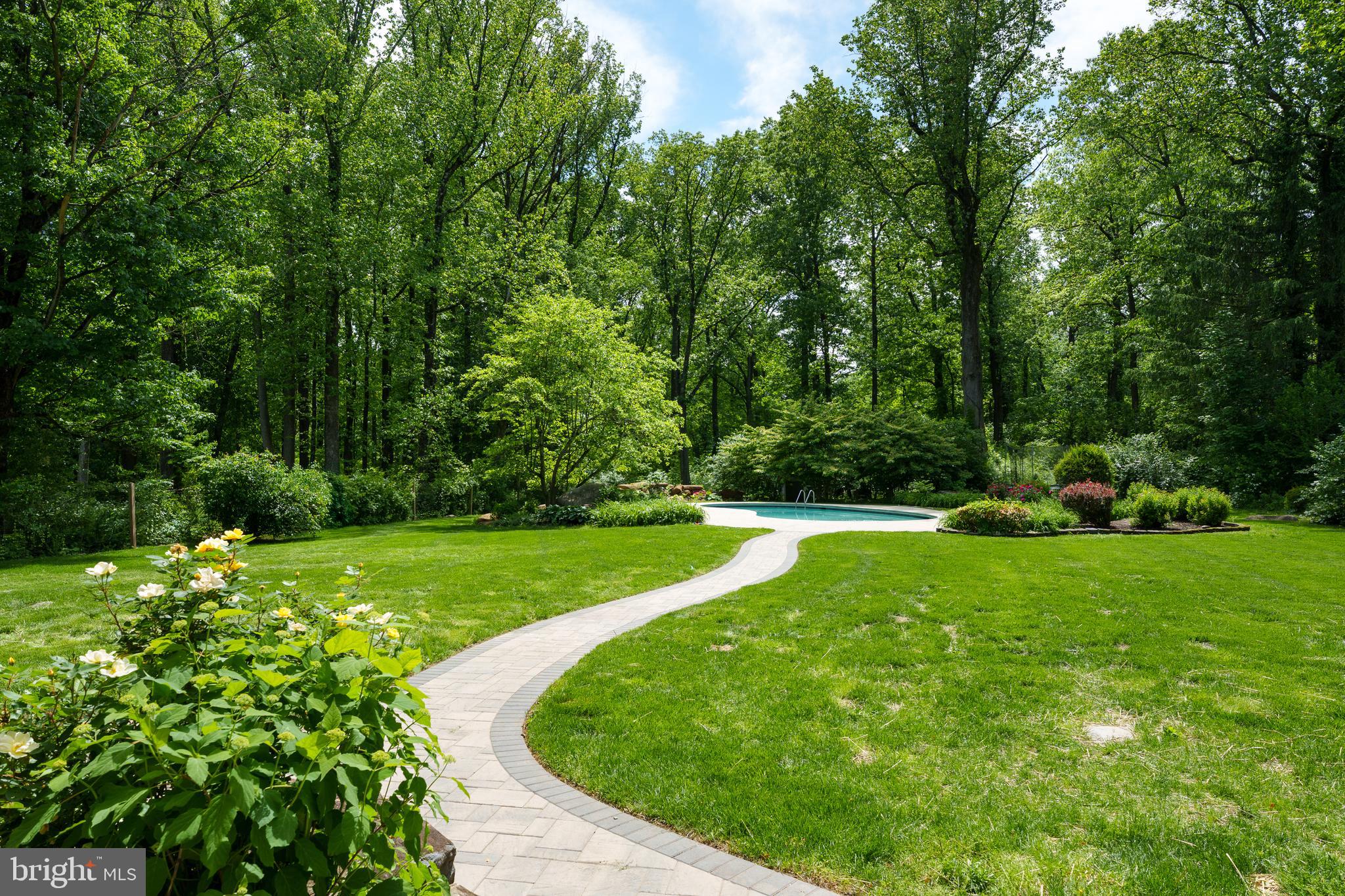 374 Cherry Hill Road Princeton, NJ 08540 - Photo 3 of 42 a view of a garden with a building