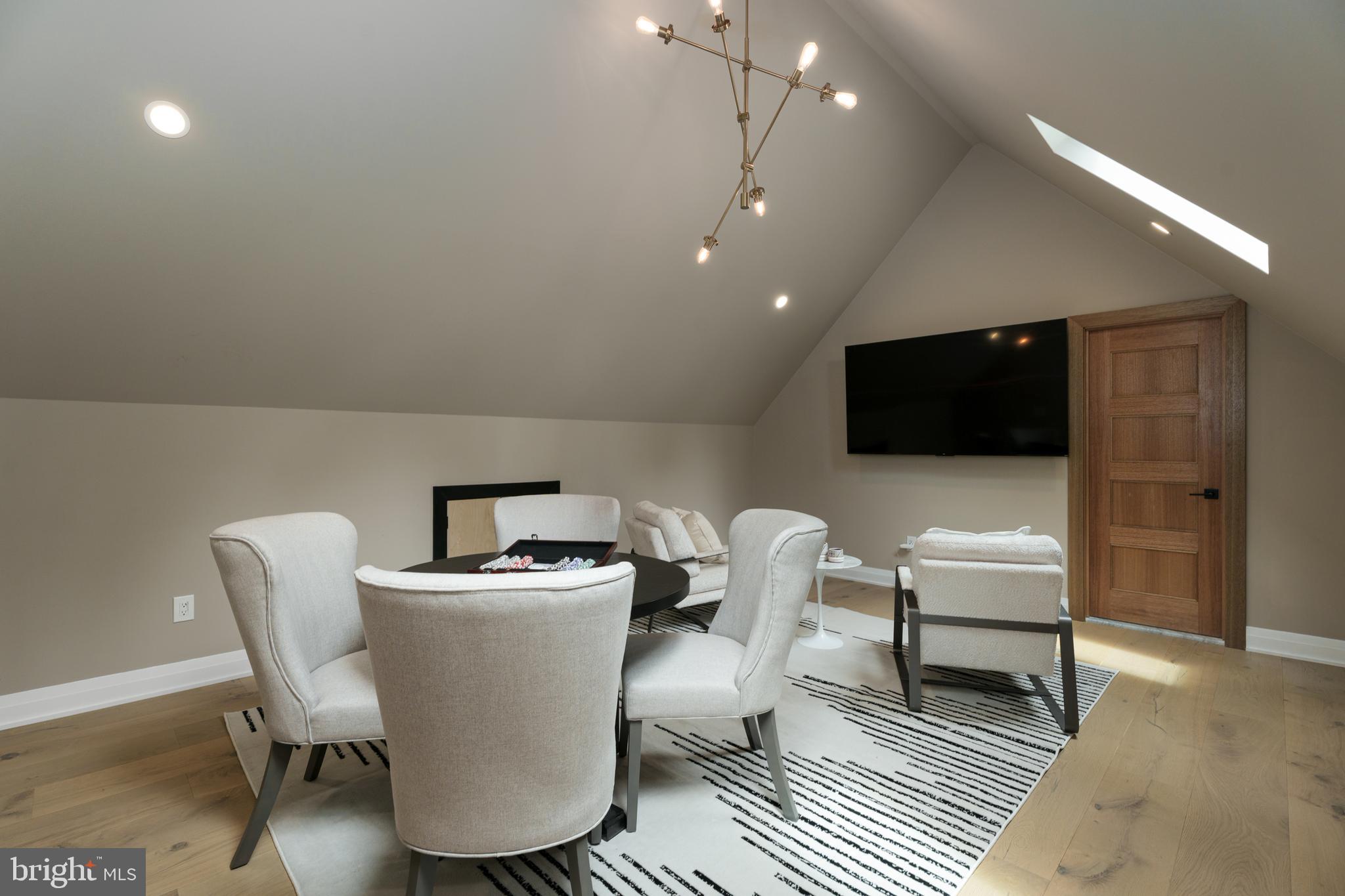 374 Cherry Hill Road Princeton, NJ 08540 - Photo 31 of 42 a living room with a couch and a flat screen tv