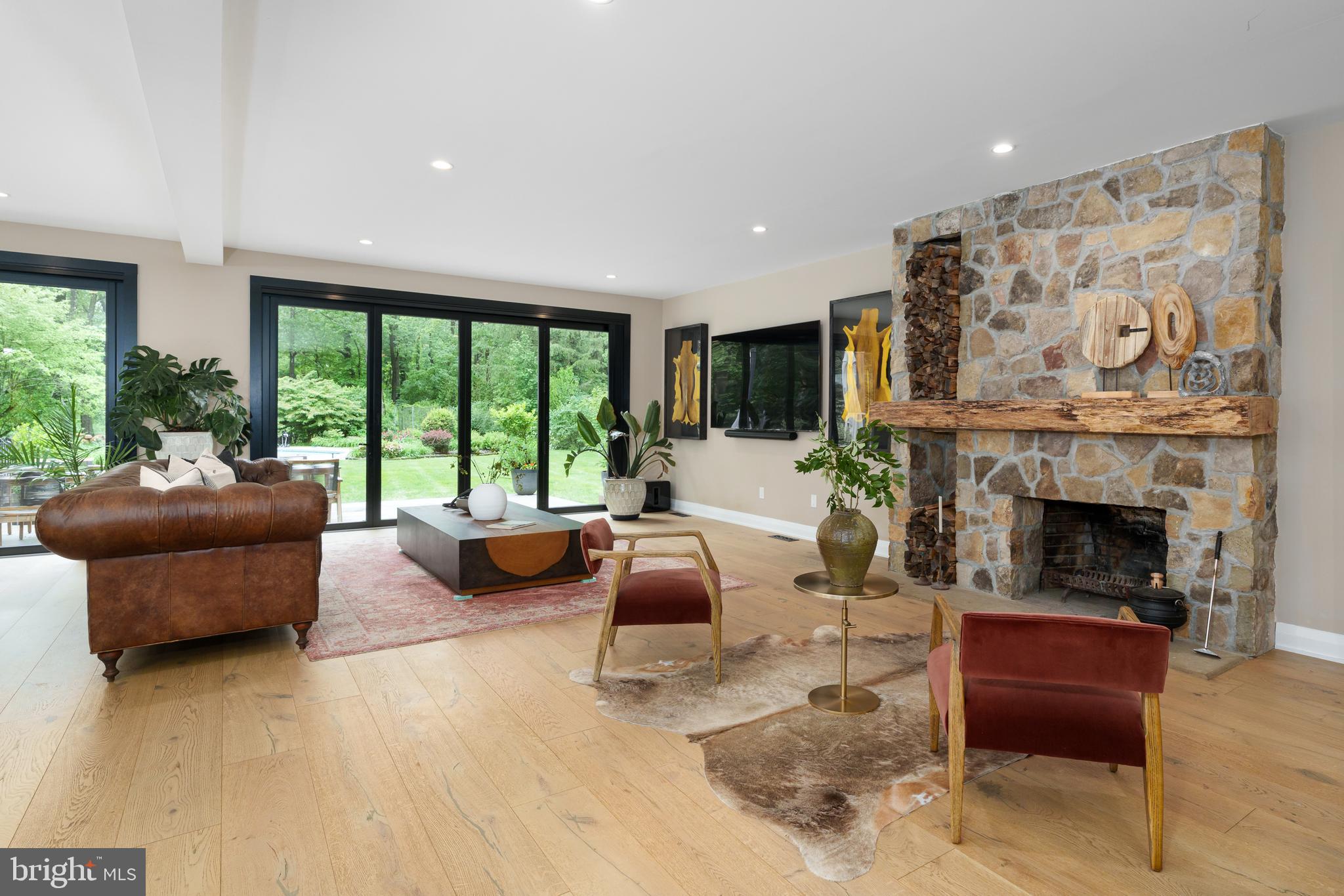 374 Cherry Hill Road Princeton, NJ 08540 - Photo 6 of 42 a living room with furniture and a fireplace
