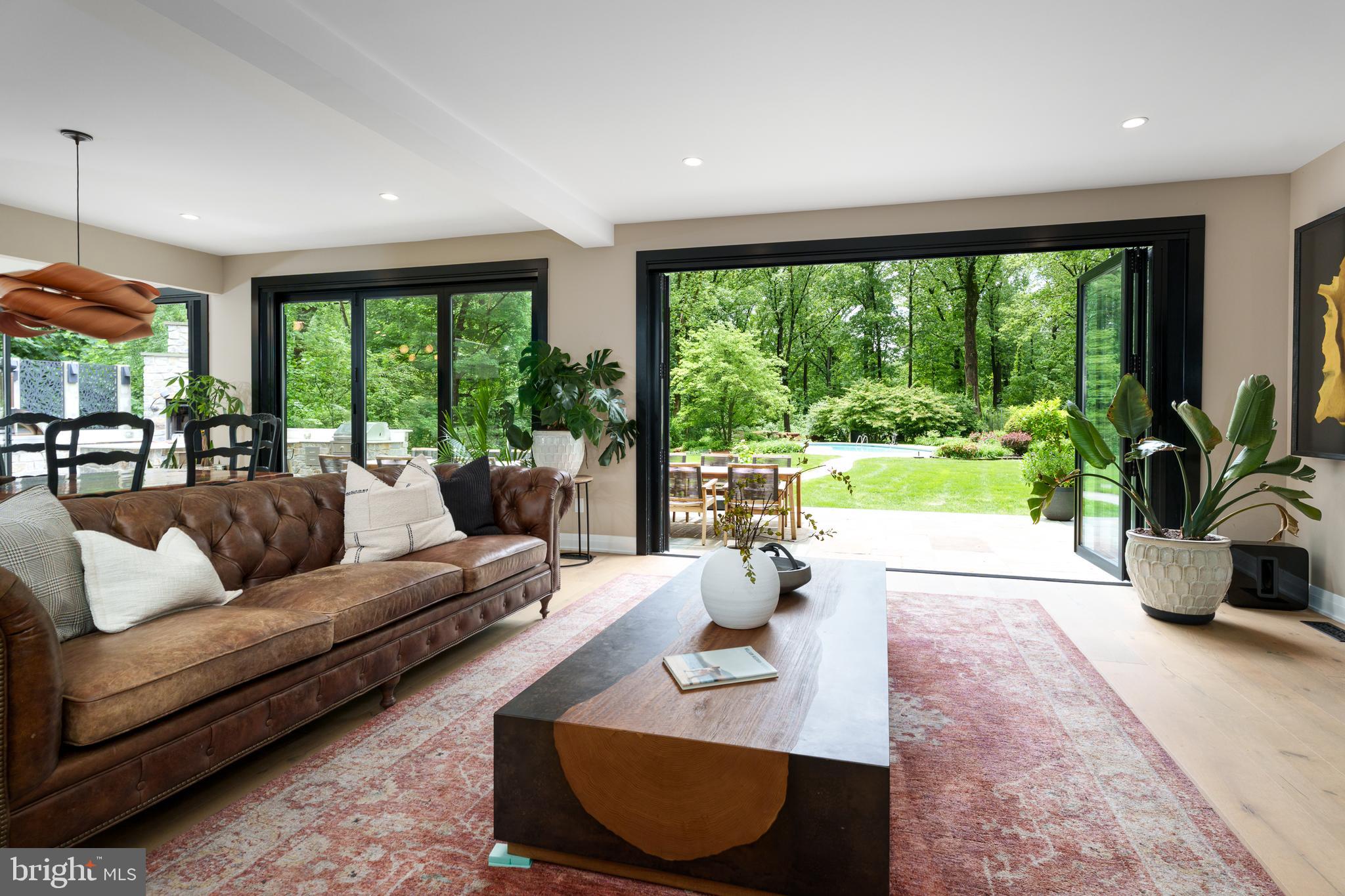 374 Cherry Hill Road Princeton, NJ 08540 - Photo 8 of 42 a living room with furniture and a large window