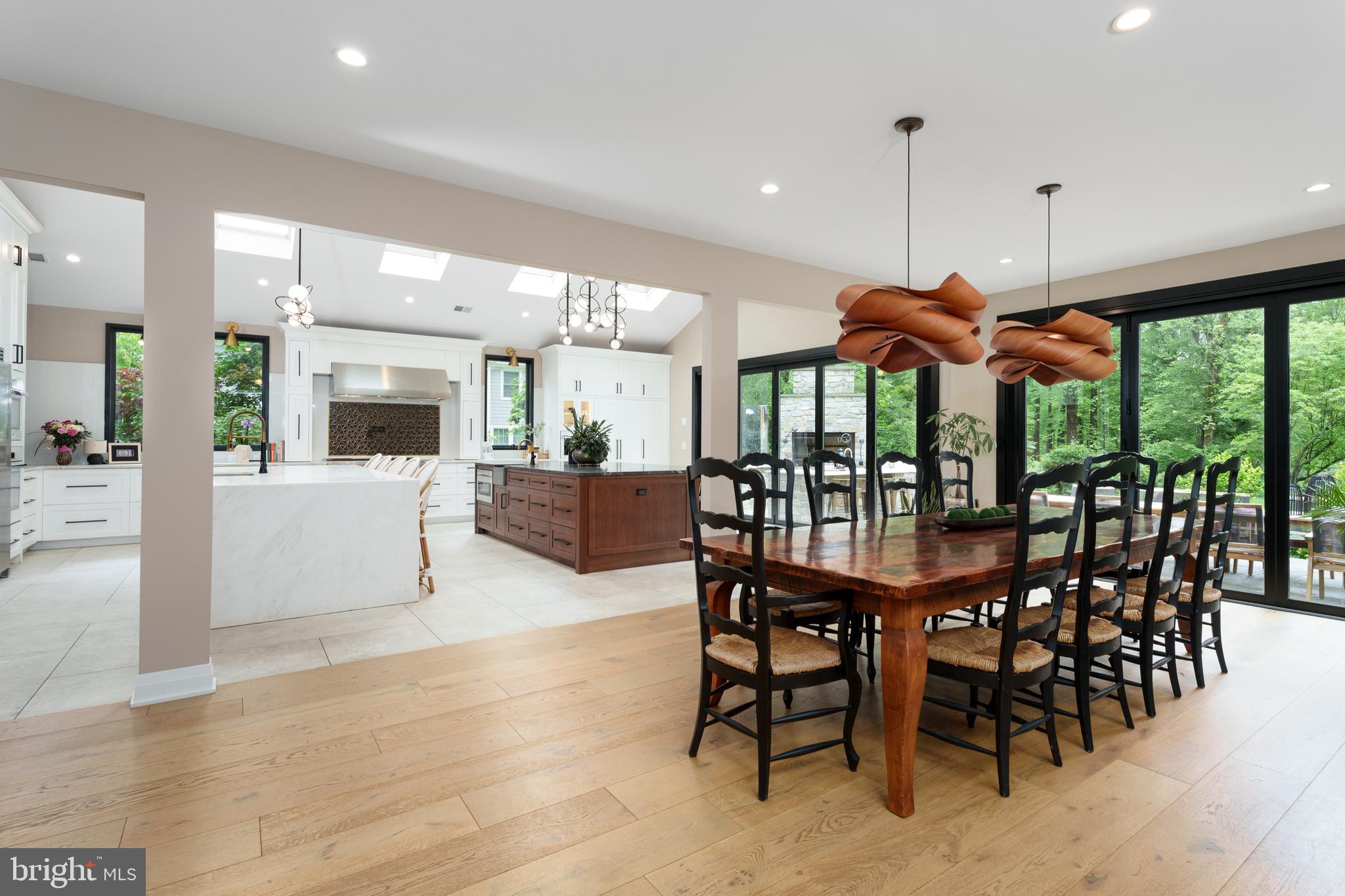 374 Cherry Hill Road Princeton, NJ 08540 - Photo 9 of 42 a view of a dining room with furniture wooden floor and chandelier
