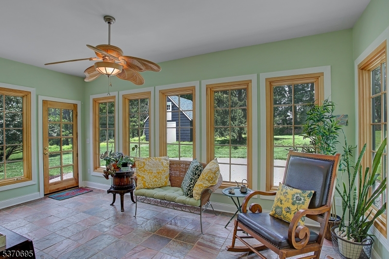 121 Stanton Mountain Road Lebanon, NJ 08833 - Photo 21 of 50 a living room filled with furniture and a chandelier