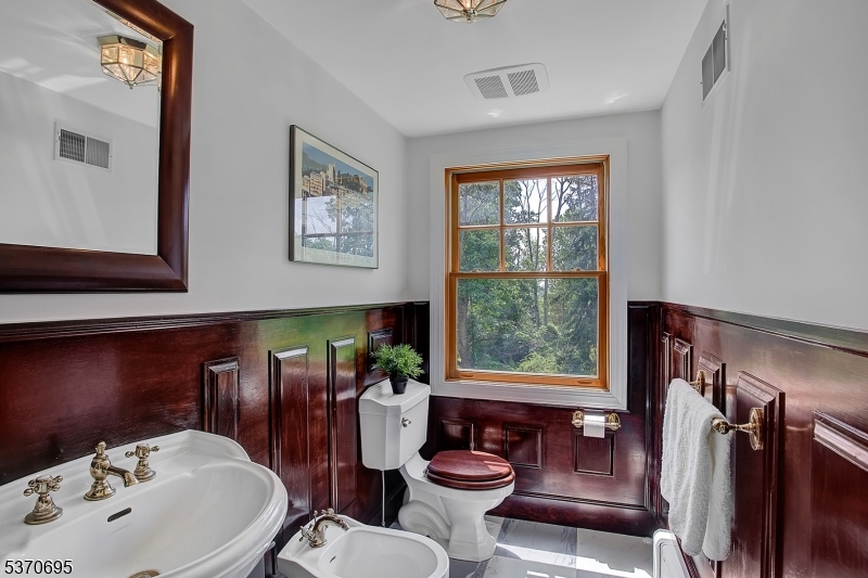 121 Stanton Mountain Road Lebanon, NJ 08833 - Photo 35 of 50 a bathroom with a sink and a mirror