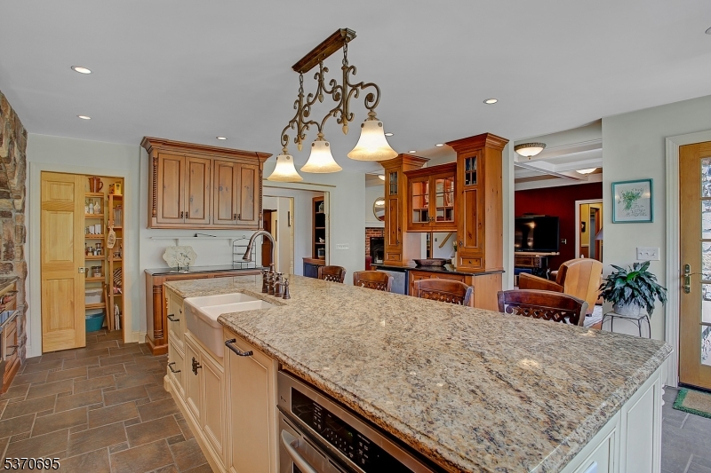 121 Stanton Mountain Road Lebanon, NJ 08833 - Photo 10 of 50 a kitchen with stainless steel appliances granite countertop a sink and cabinets