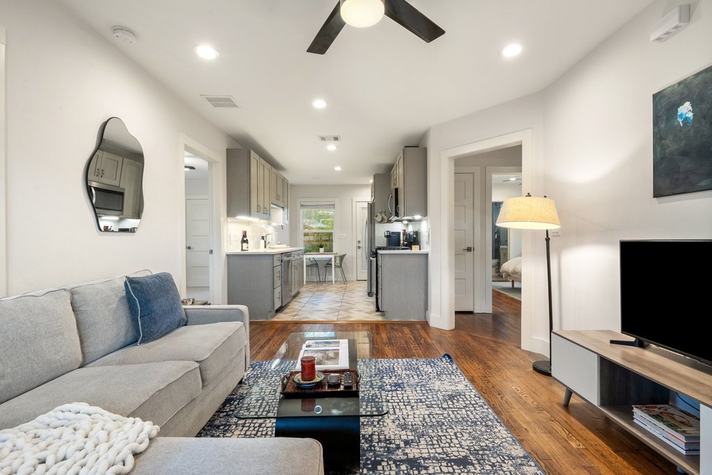 2702 Crest Avenue, Unit 1 Austin, TX 78702 - Photo 1 of 29 The open layout allows the living room to flow effortlessly into the kitchen and dining areas.