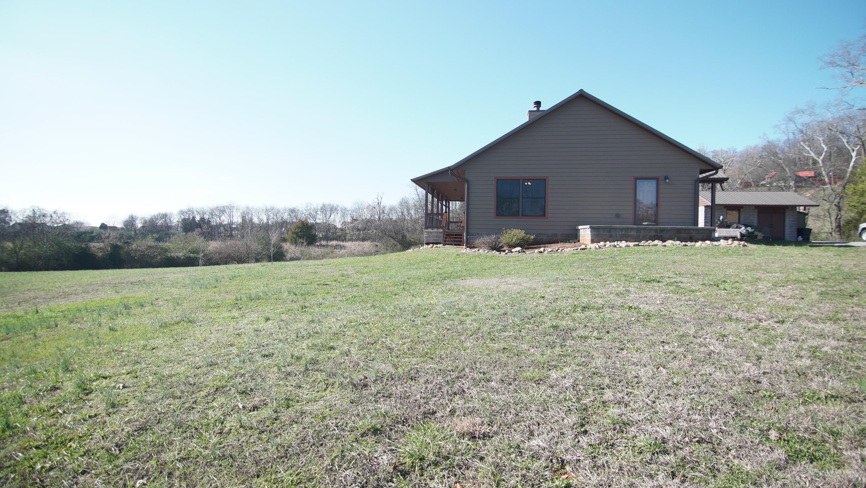 5711 Sinking Creek Road Greenback, TN 37742 - Photo 5 of 38 With metal roof & storage shed