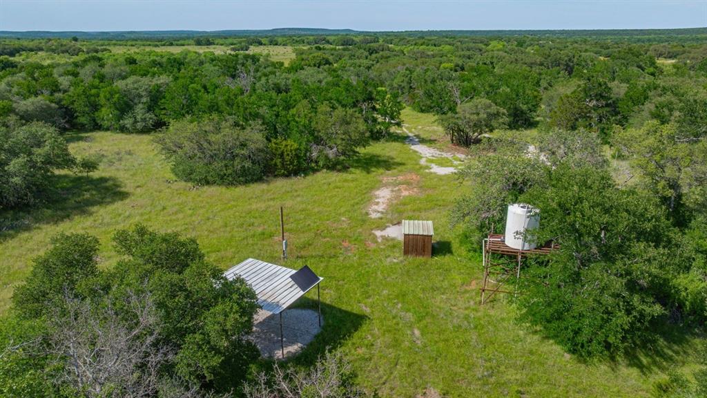 136 Moose Trail Ranger, TX 76470 - Photo 15 of 40 a view of a golf course with a lake