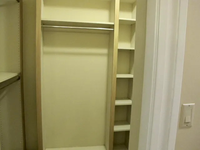 a bathroom with a glass door