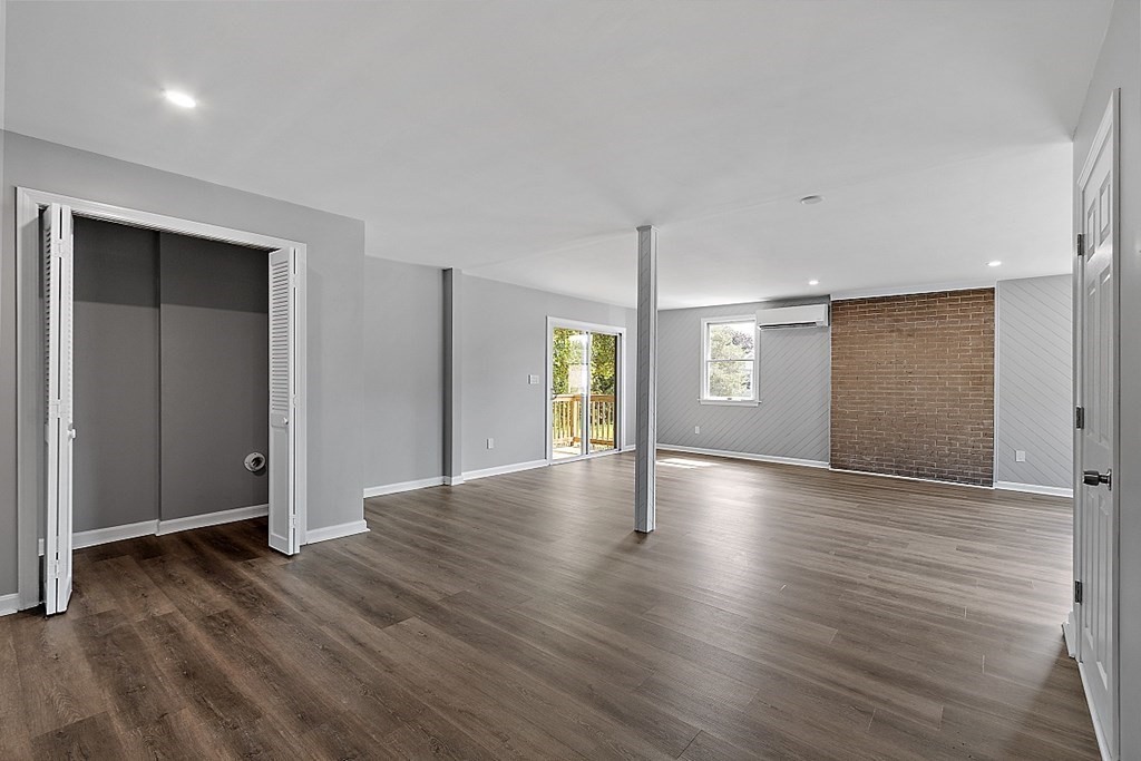 46 West Meadow Road Lowell, MA 01854 - Photo 14 of 42 a view of livingroom with hardwood floor and window