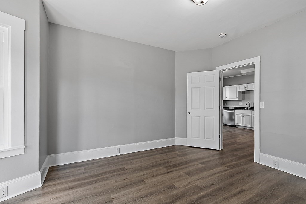 46 West Meadow Road Lowell, MA 01854 - Photo 25 of 42 a view of empty room with wooden floor