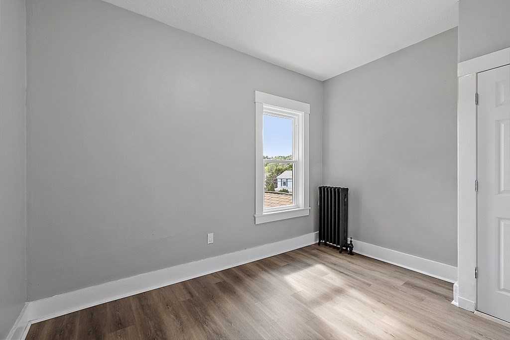 46 West Meadow Road Lowell, MA 01854 - Photo 35 of 42 an empty room with windows