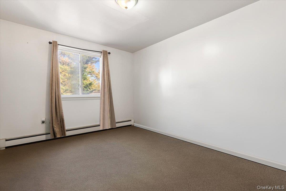1827 Patterson Avenue Bronx, NY 10473 - Photo 12 of 31 an empty room with window