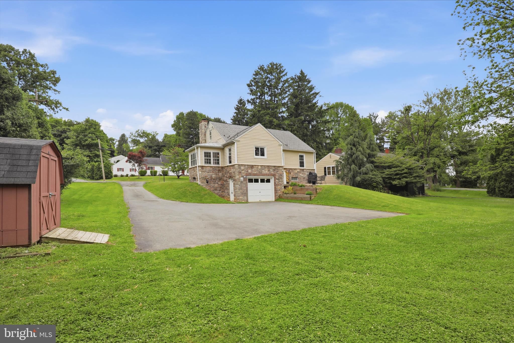 169 School House Road Lancaster, PA 17603 - Photo 33 of 39 a aerial view of a house next to a big yard and large trees
