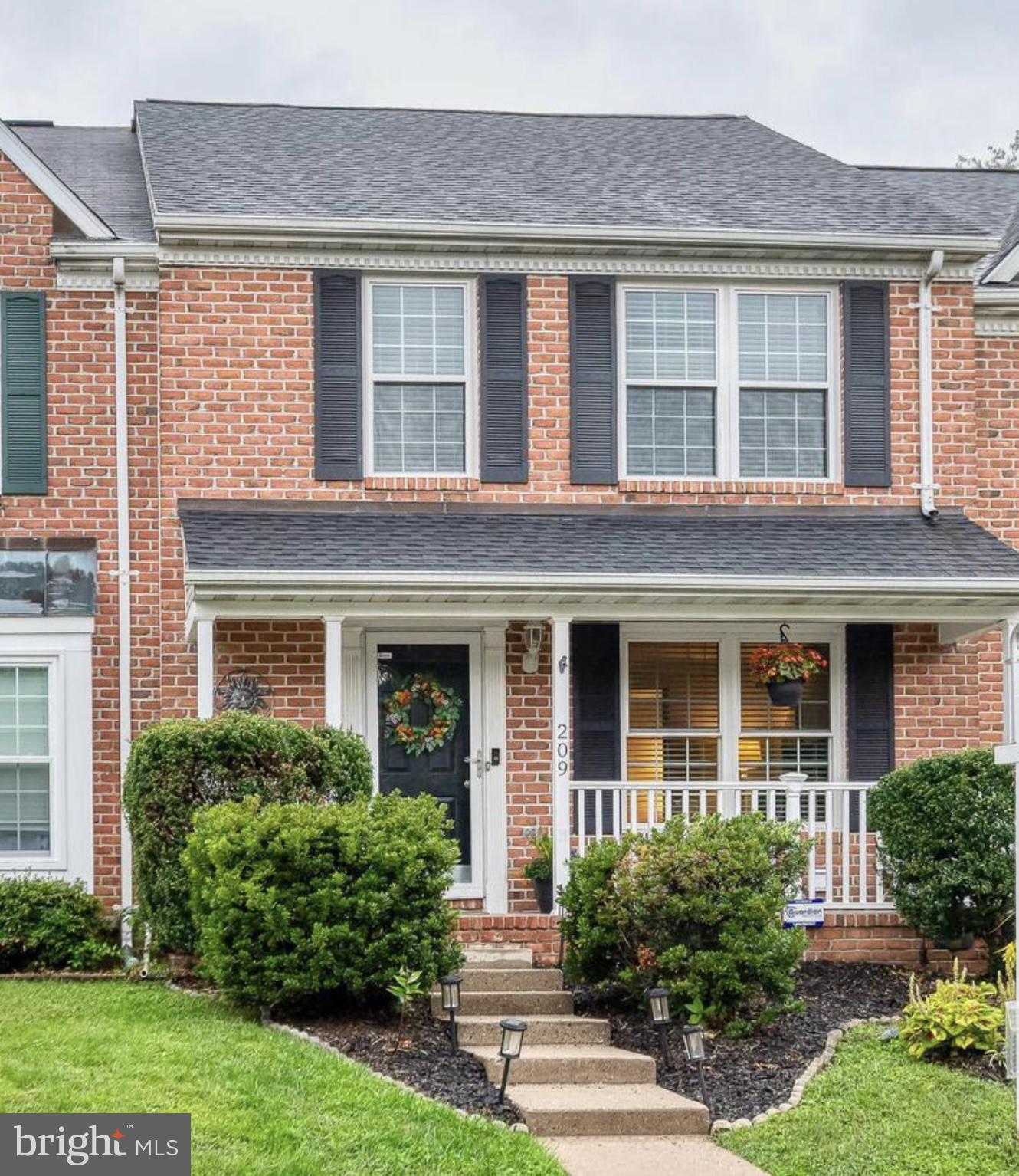 209 Hunters Run Terrace Bel Air, MD 21015 - Photo 1 of 17 front view of brick house with a yard and plants