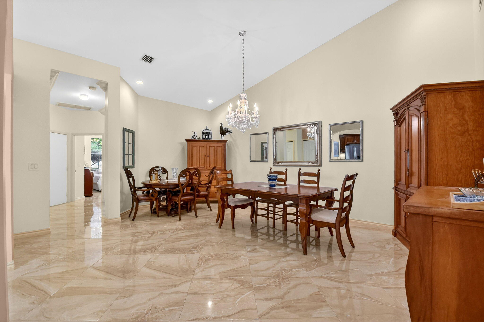 6164 Petunia Road Delray Beach, FL 33484 - Photo 11 of 62 a view of a dining area with furniture