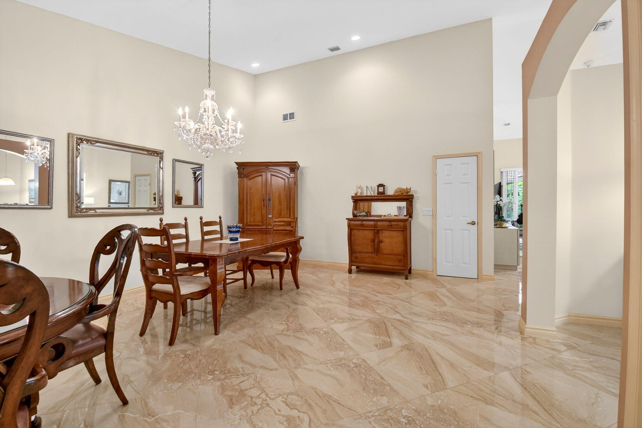 6164 Petunia Road Delray Beach, FL 33484 - Photo 12 of 62 a view of a dining room with furniture