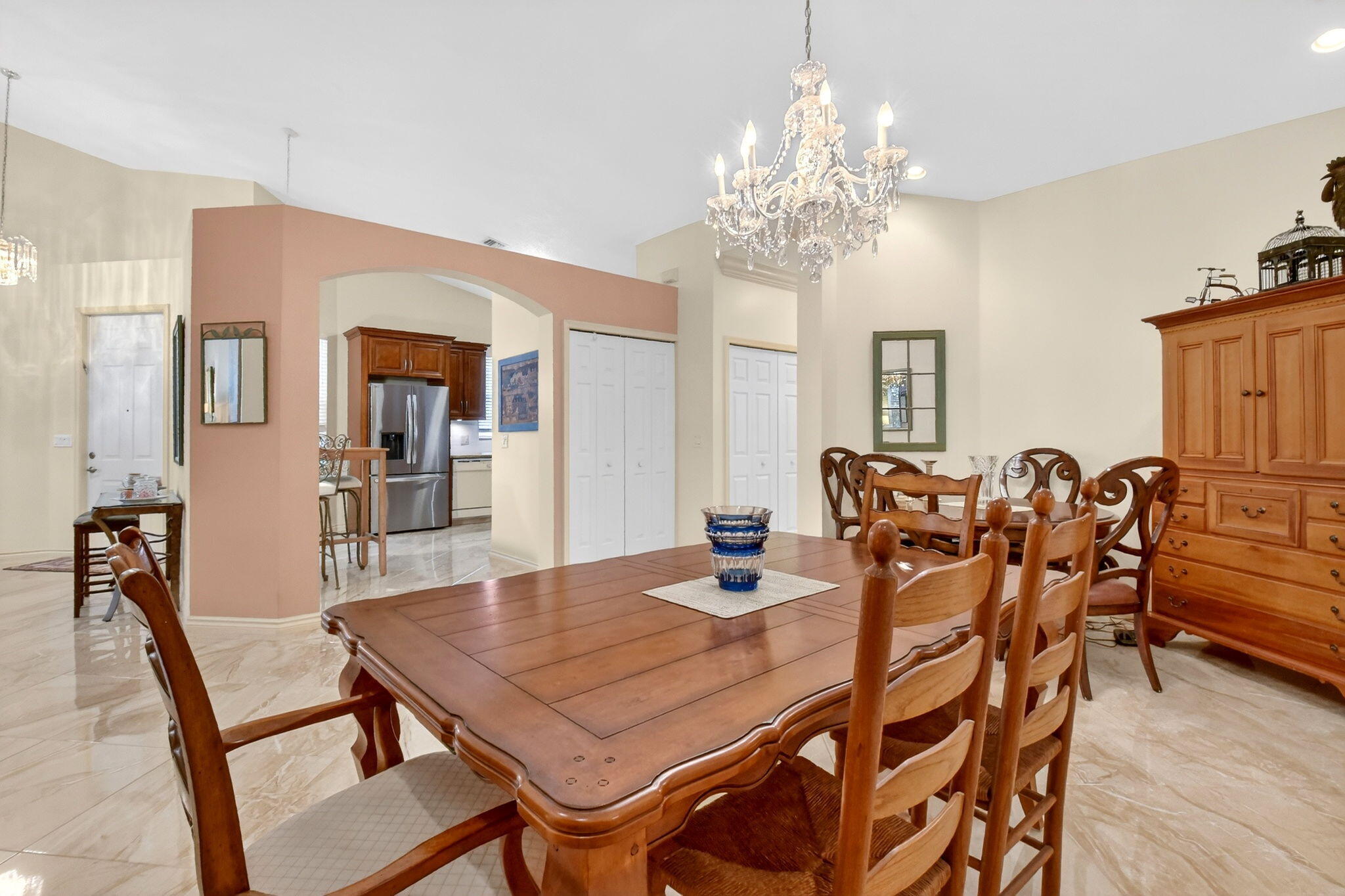 6164 Petunia Road Delray Beach, FL 33484 - Photo 14 of 62 a view of a dining room with furniture and wooden floor