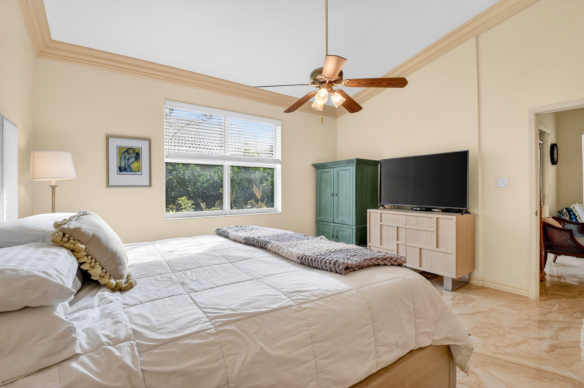 6164 Petunia Road Delray Beach, FL 33484 - Photo 23 of 62 a bedroom with a bed tv and a window