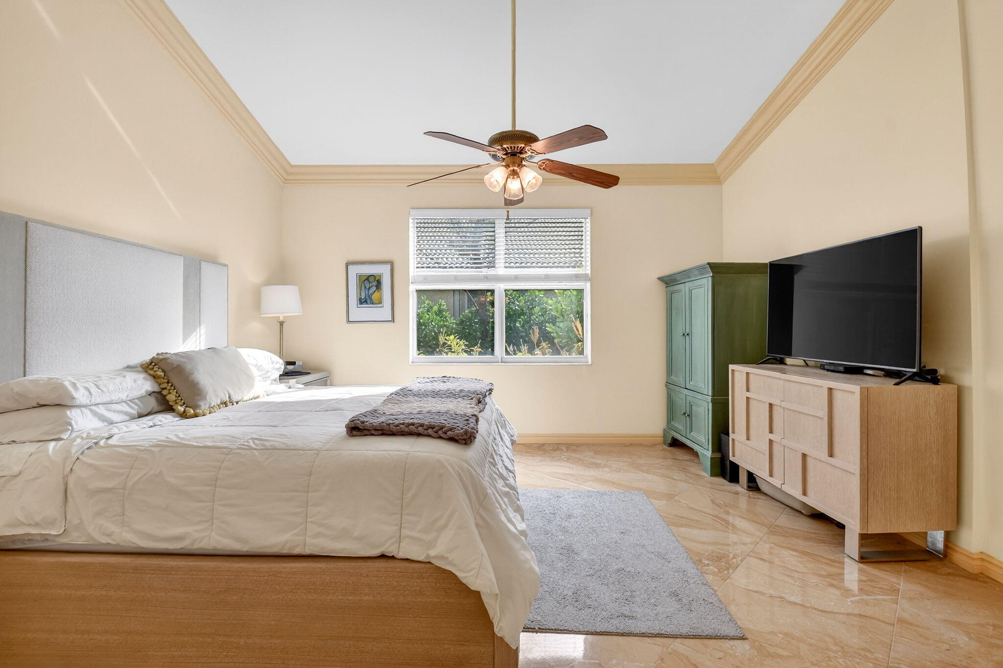 6164 Petunia Road Delray Beach, FL 33484 - Photo 24 of 62 a bedroom with a bed and a flat screen tv