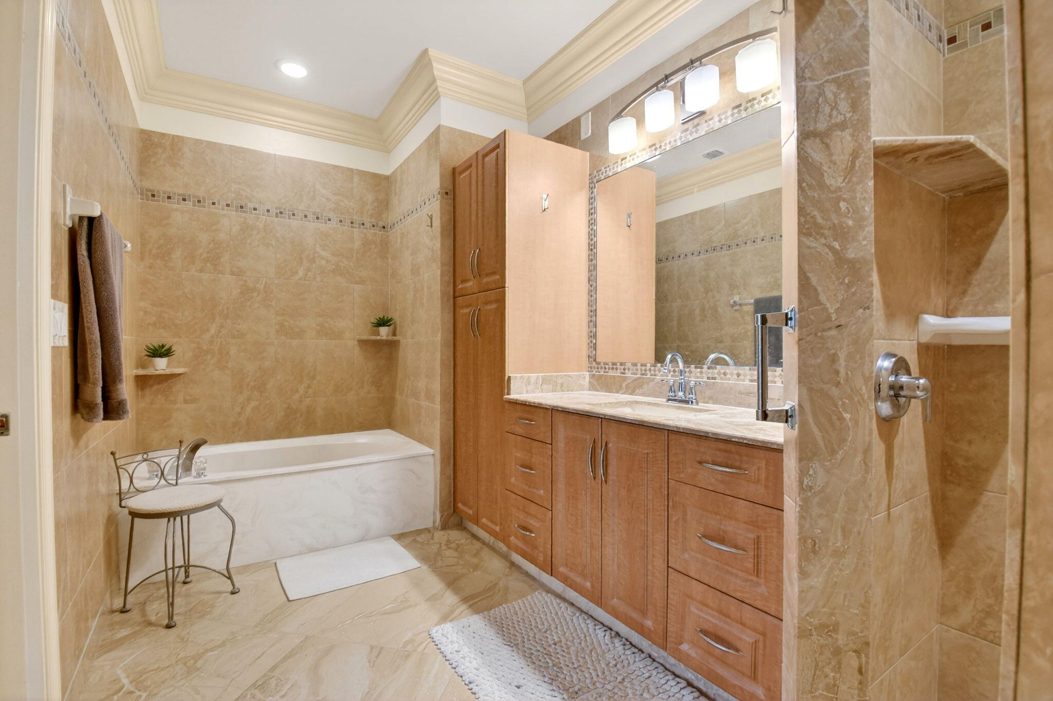 6164 Petunia Road Delray Beach, FL 33484 - Photo 27 of 62 a bathroom with a double vanity sink toilet and shower