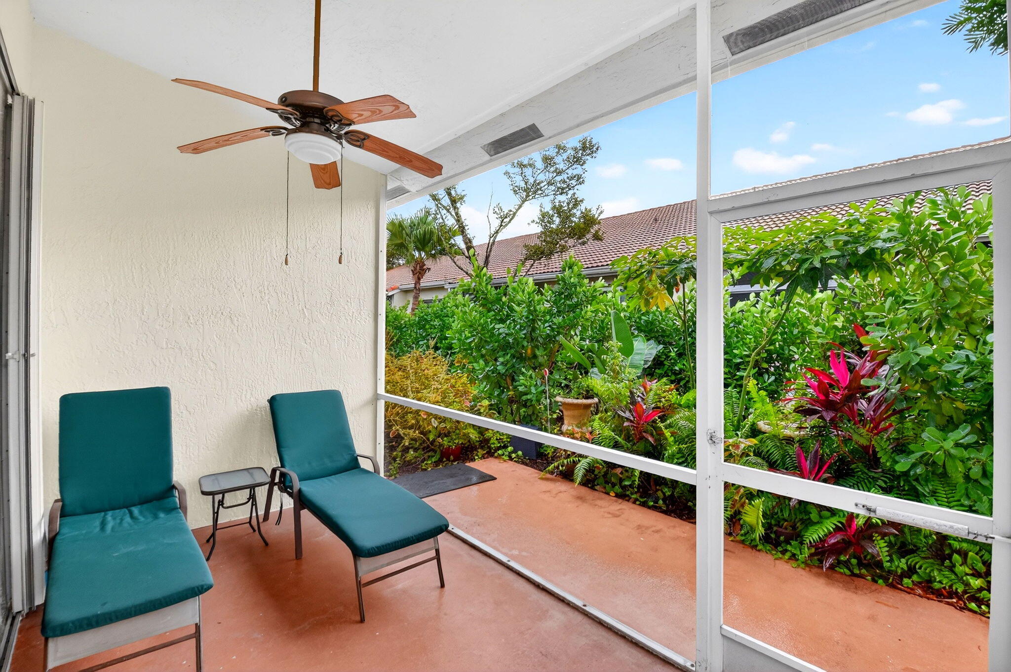 6164 Petunia Road Delray Beach, FL 33484 - Photo 33 of 62 a view of a chairs and table in a balcony