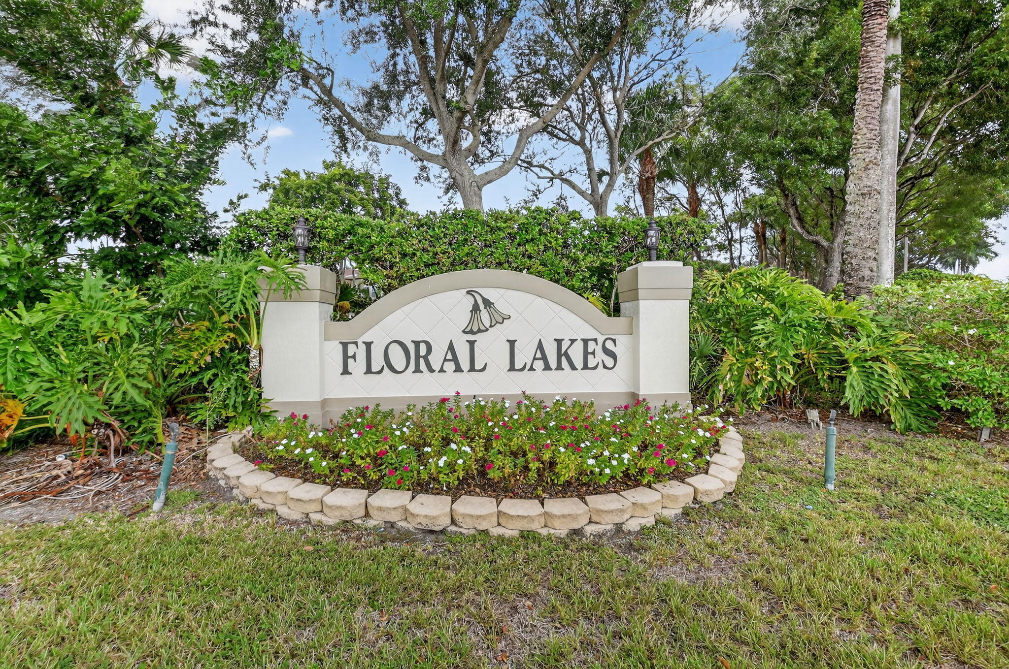 6164 Petunia Road Delray Beach, FL 33484 - Photo 45 of 62 a sign on the side of the road