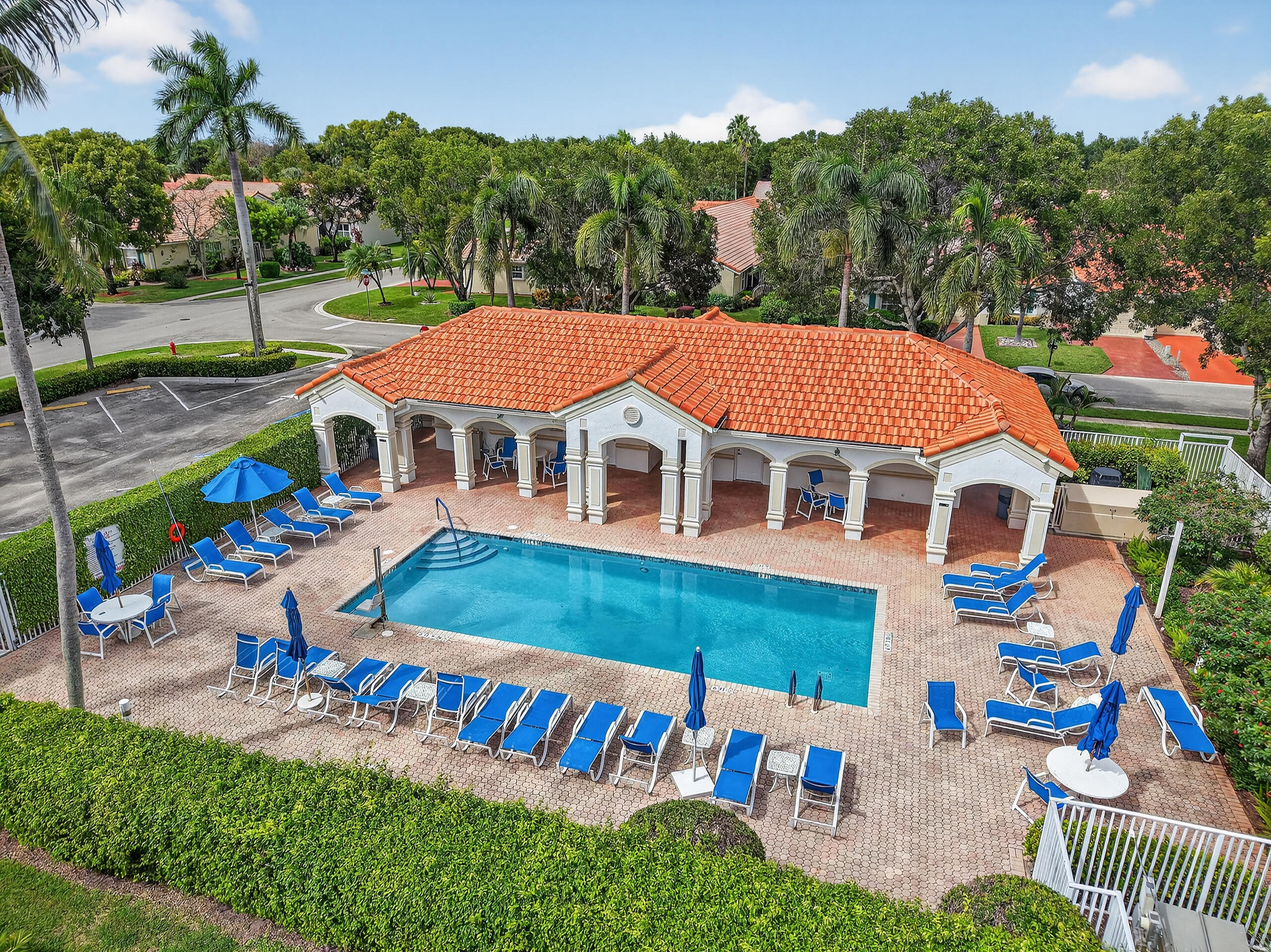 6164 Petunia Road Delray Beach, FL 33484 - Photo 59 of 62 an aerial view of a house with a yard and potted plants
