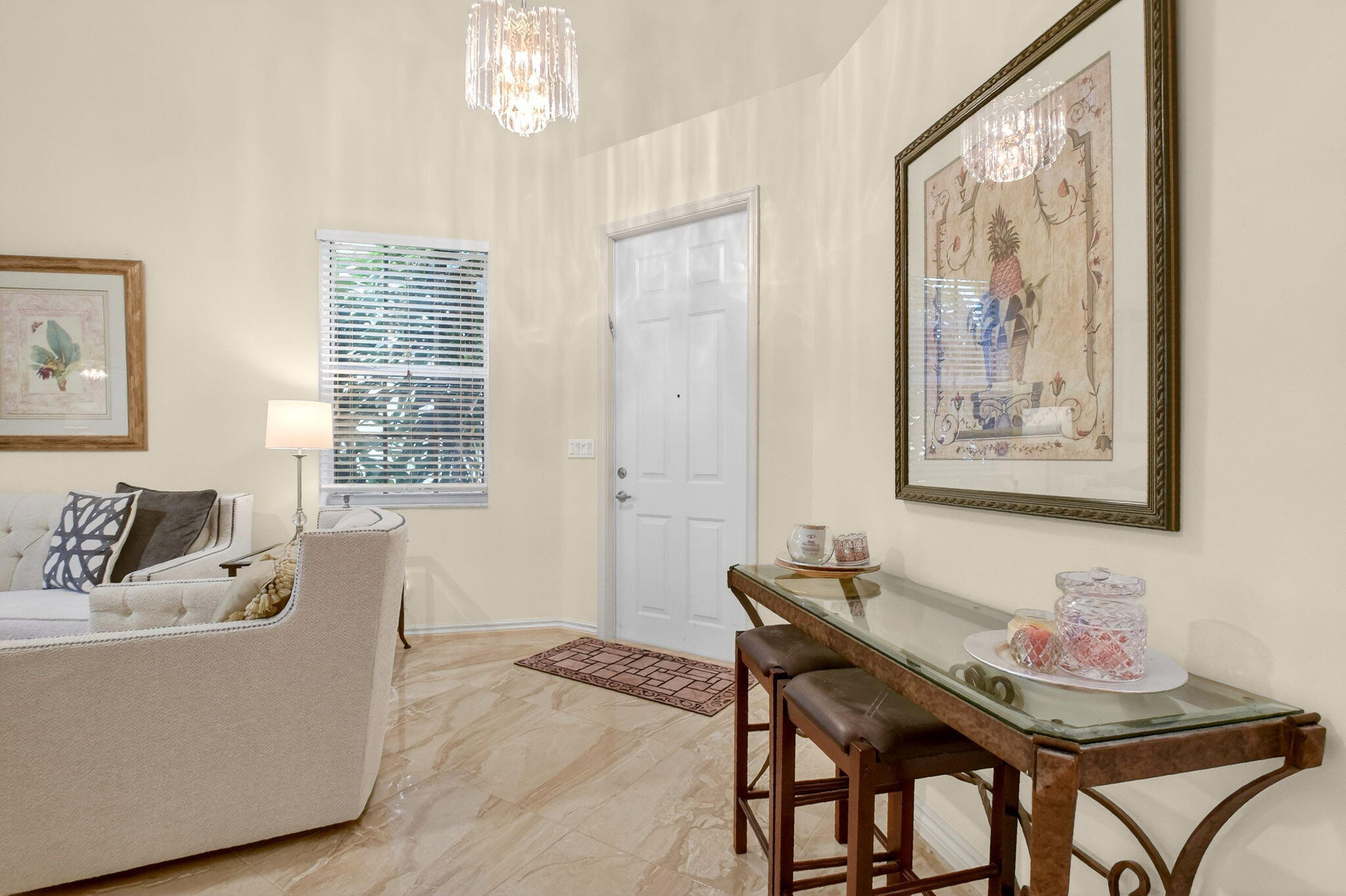 6164 Petunia Road Delray Beach, FL 33484 - Photo 6 of 62 a living room with furniture and a large window
