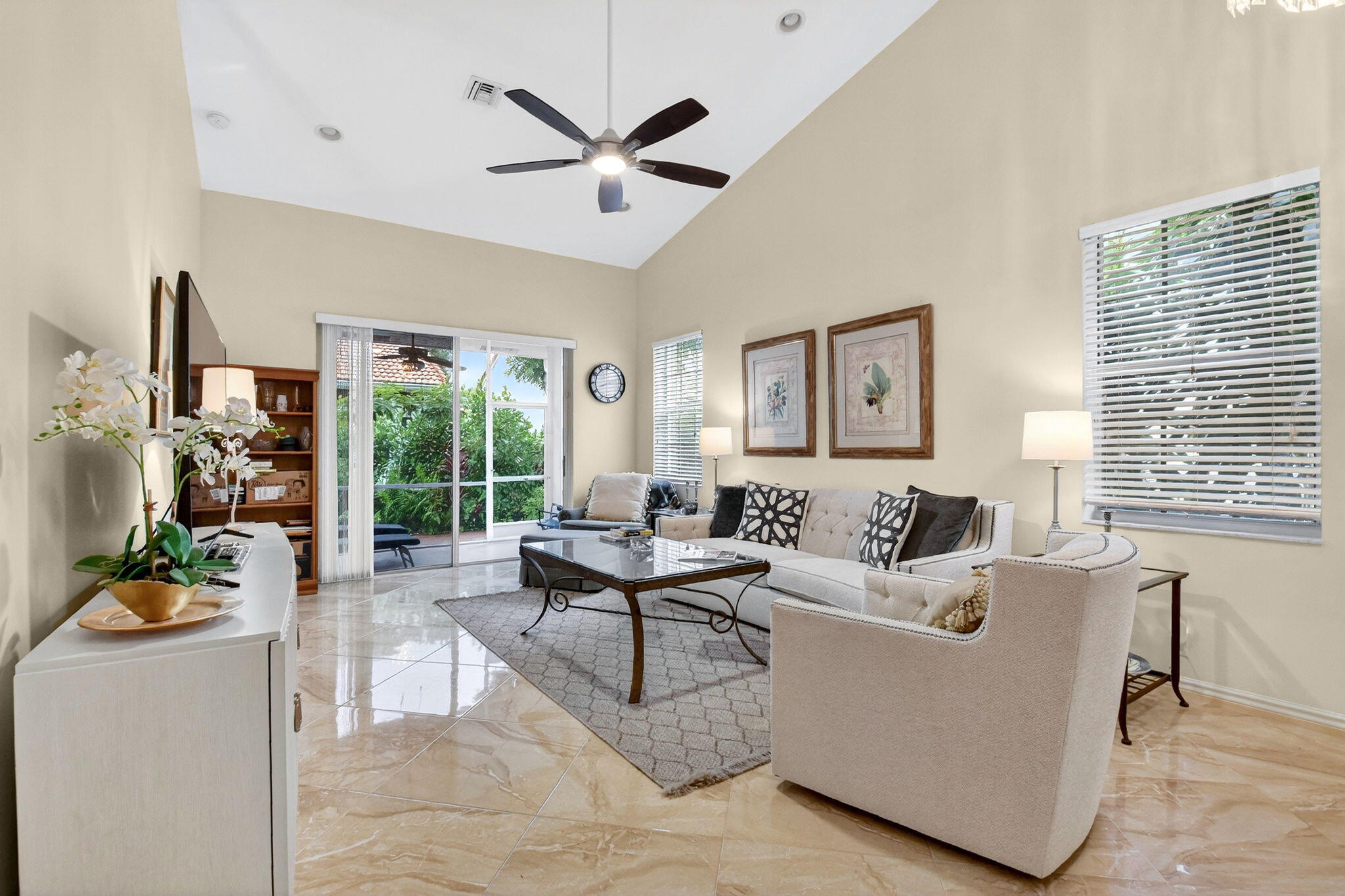 6164 Petunia Road Delray Beach, FL 33484 - Photo 9 of 62 a living room with furniture and a large window