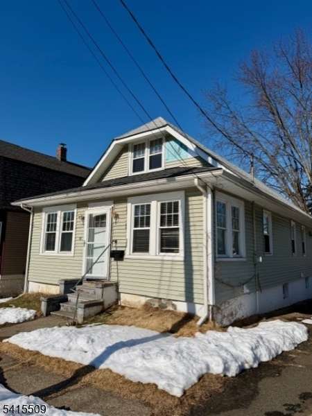 58 Stanley Road North Caldwell, NJ 07006 - Photo 1 of 2 a front view of a house with a yard