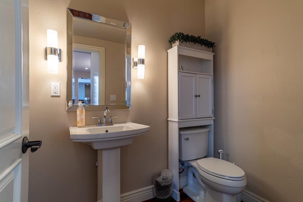 2985 Day Road Gilroy, CA 95020 - Photo 26 of 72 a bathroom with a sink toilet and mirror