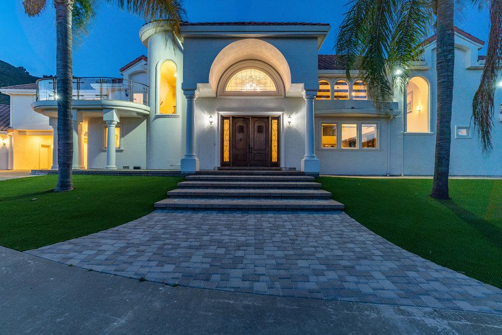 2985 Day Road Gilroy, CA 95020 - Photo 3 of 72 a view of a house with many windows and a yard
