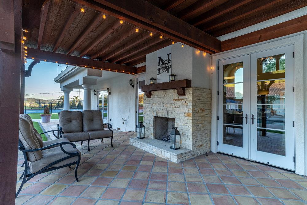 2985 Day Road Gilroy, CA 95020 - Photo 53 of 72 a view of a porch with furniture and a fireplace