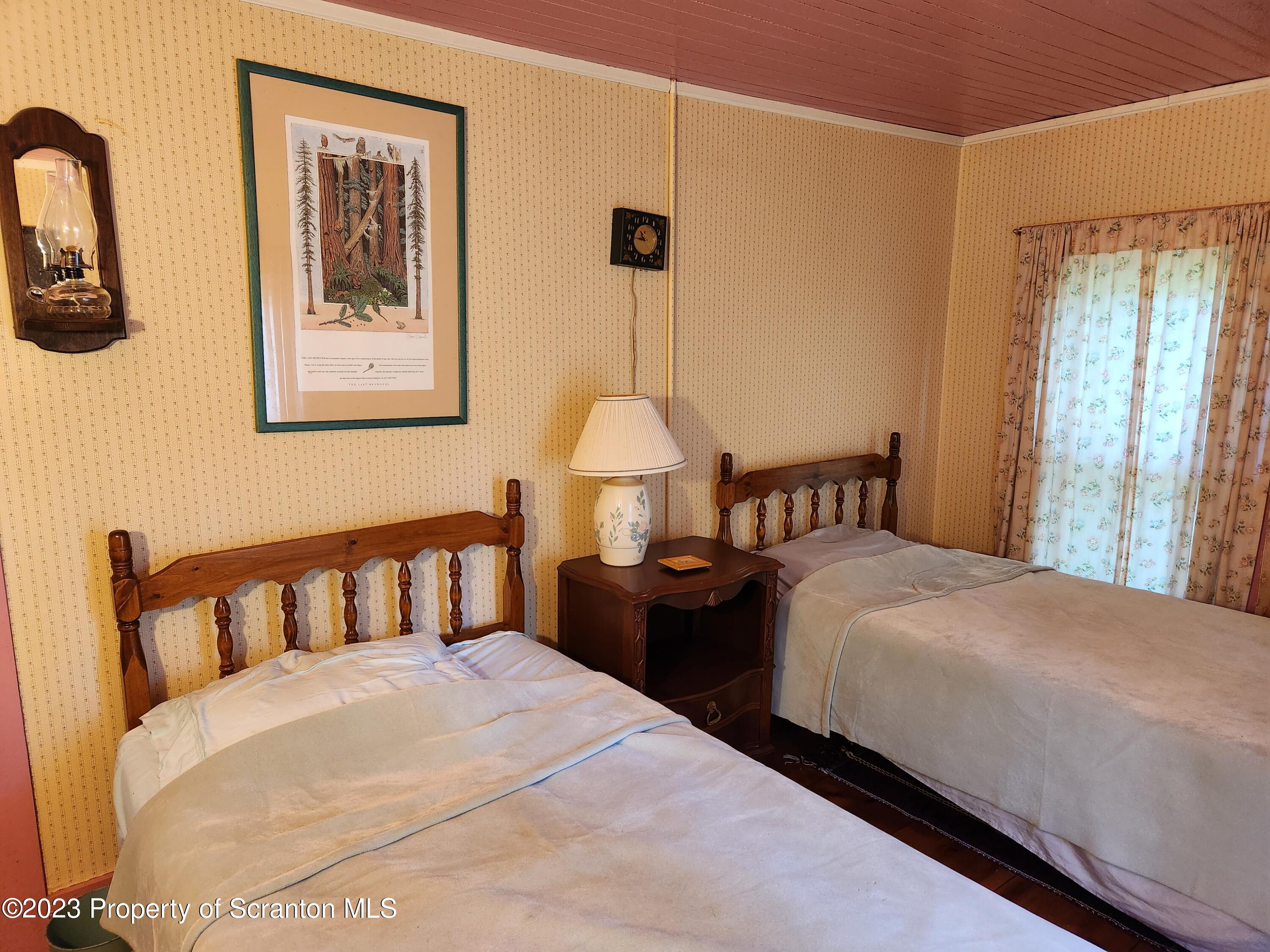 577 Farley Road Meshoppen, PA 18630 - Photo 8 of 35 a bedroom with bed and window