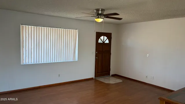 an empty room with windows