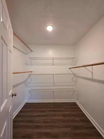 a view of a room with racks on the wall