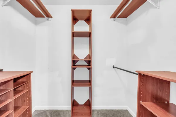 an entryway of a house with wooden floor