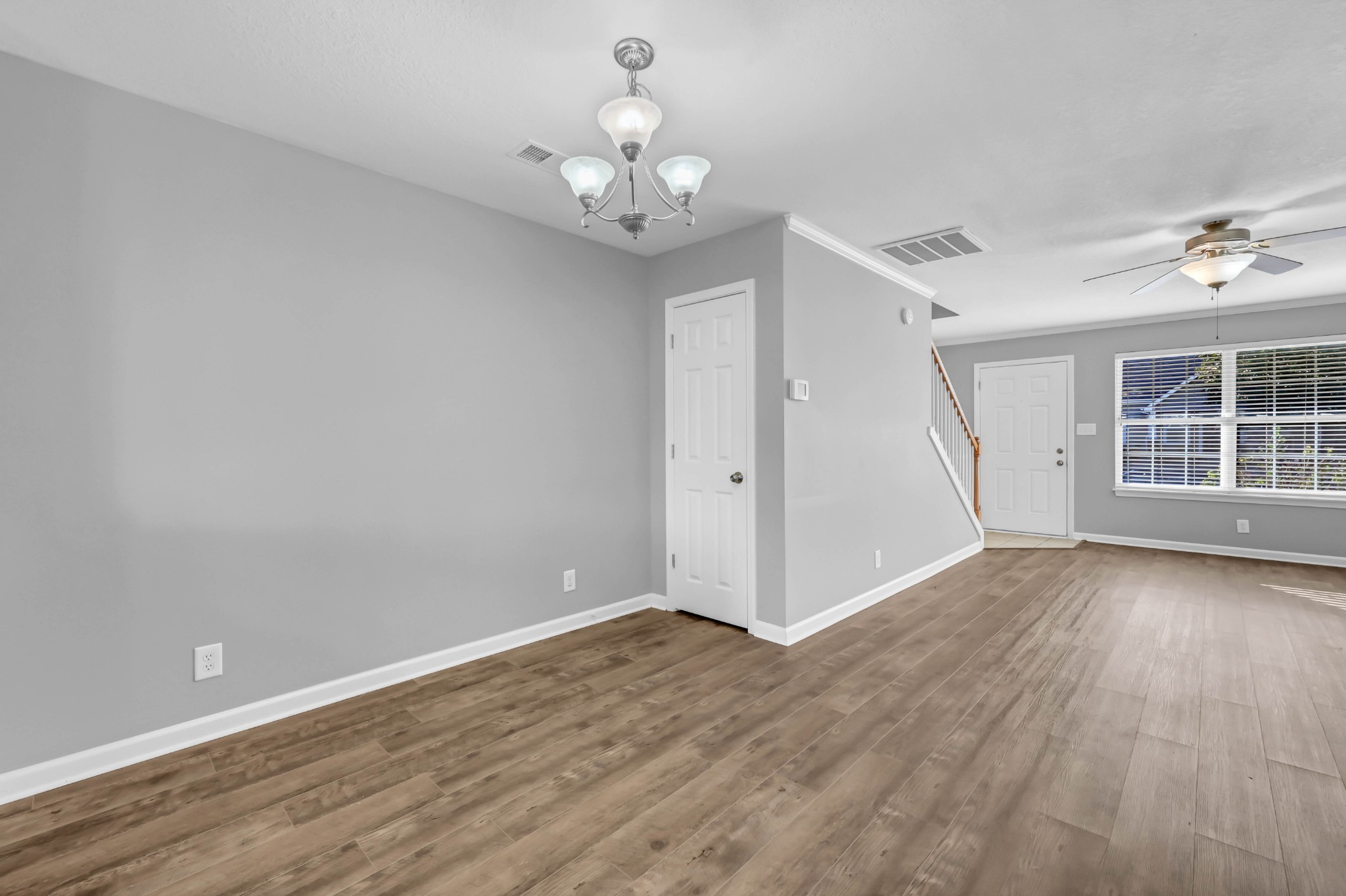 116 Alexander Boulevard Clarksville, TN 37040 - Photo 7 of 33 wooden floor in an empty room with a window