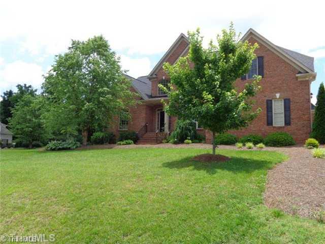 1702 Rita Court Oak Ridge, NC 27310 - Photo 1 of 16 Exterior Front. Beautifully landscaped with ornamental trees and Hostas. This home has class and elegance